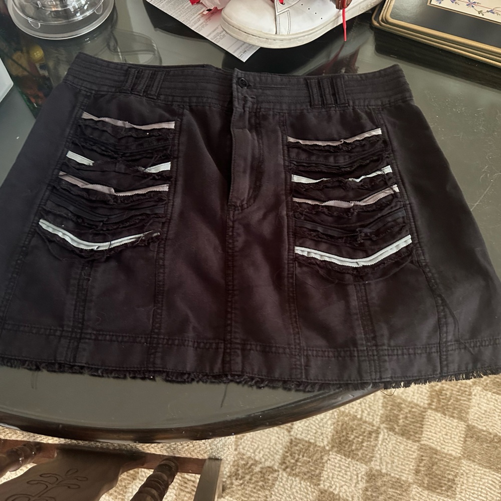 POSH STORE CLOSING
Marc Jacobs Black Mini Skirt with White and blue Details